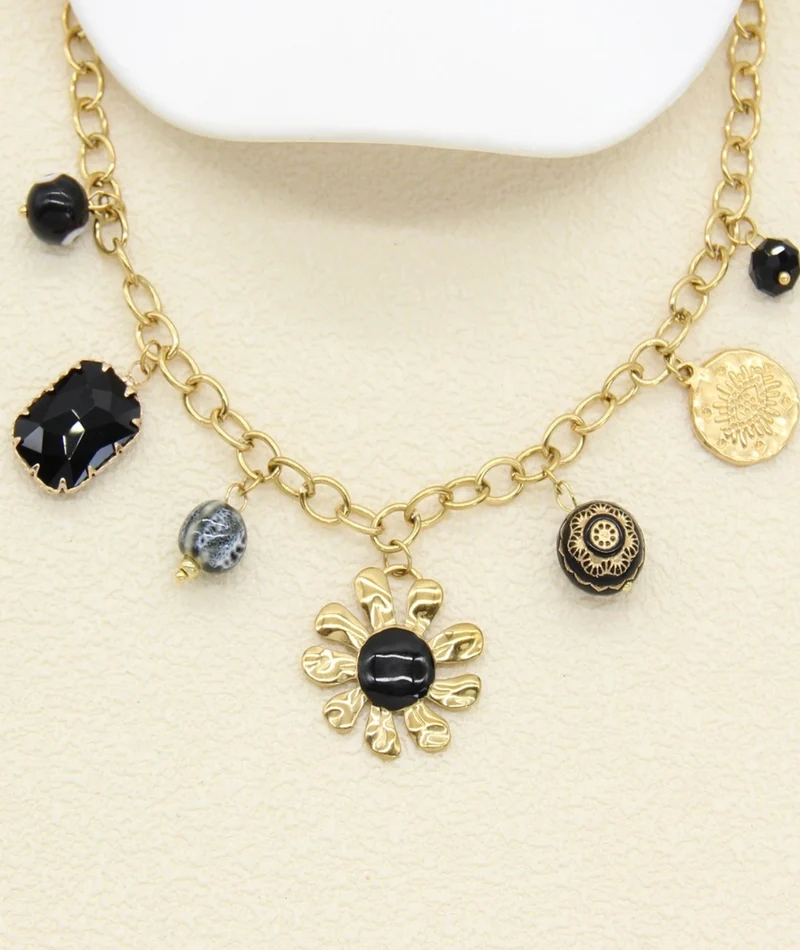 Collier charms noir et doré